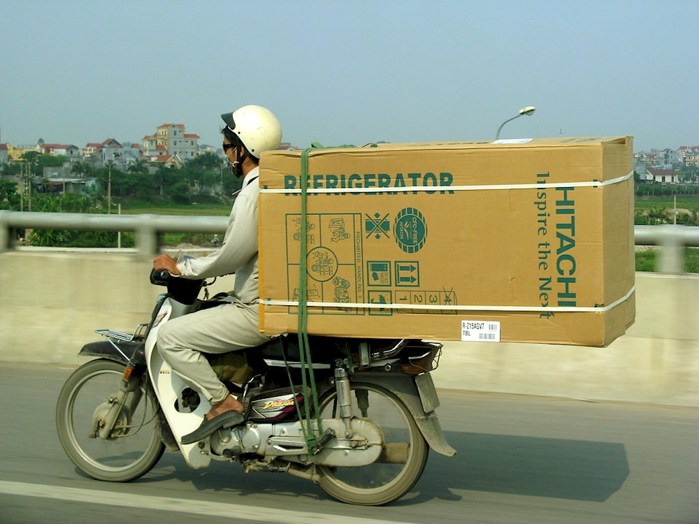 It’s common in Vietnam to see motorbikes loaded with towering stacks of goods